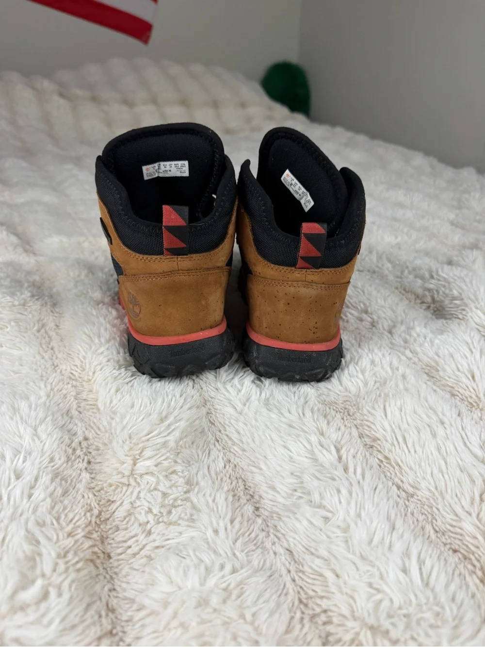 Timberland Kids Brown and Black Boots with Coral Midsole and Teal Accent